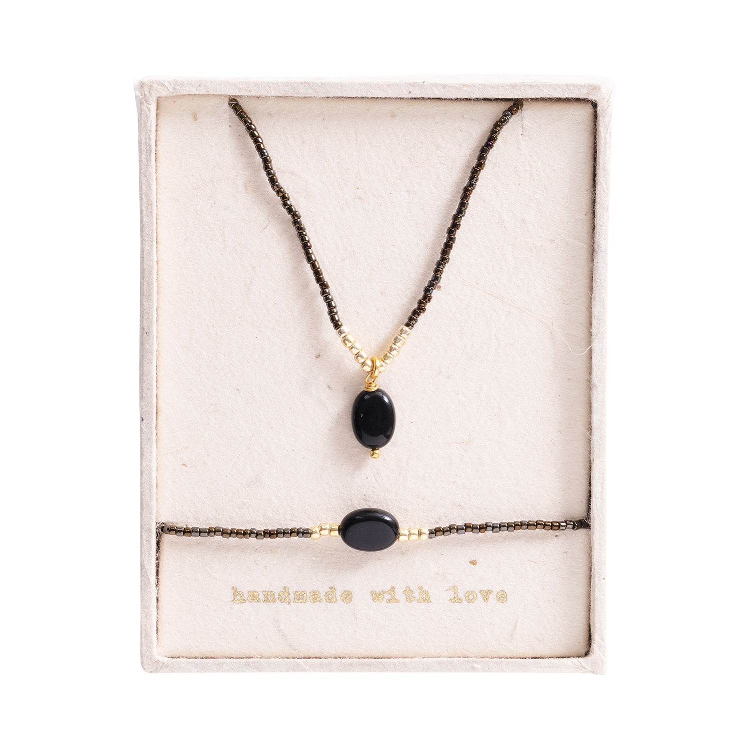 Geschenkset Confidence Schwarzer Onyx Vergoldet