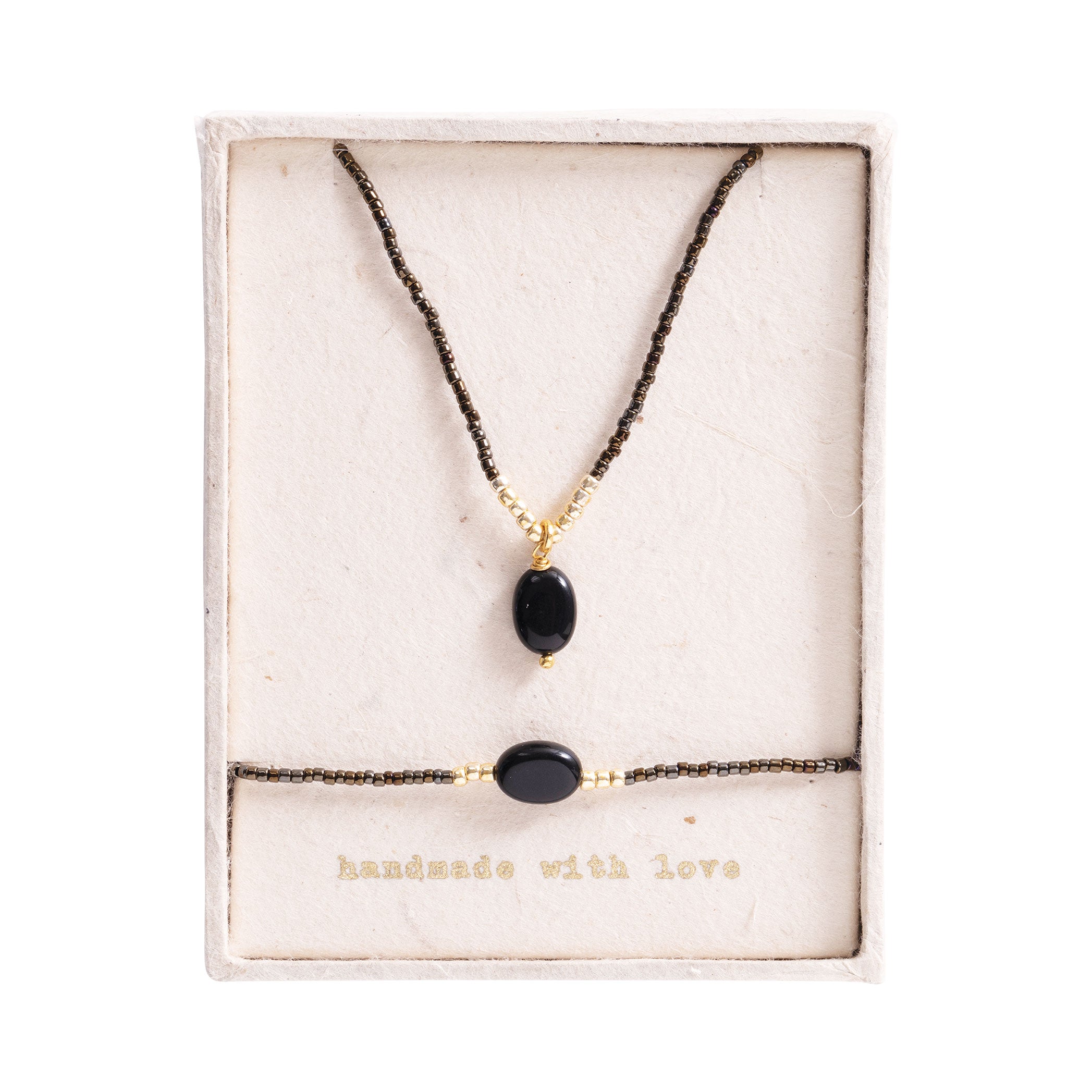 Geschenkset Confidence Schwarzer Onyx Vergoldet