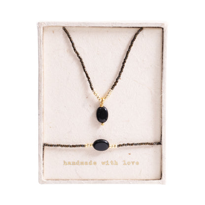Geschenkset Confidence Schwarzer Onyx Vergoldet